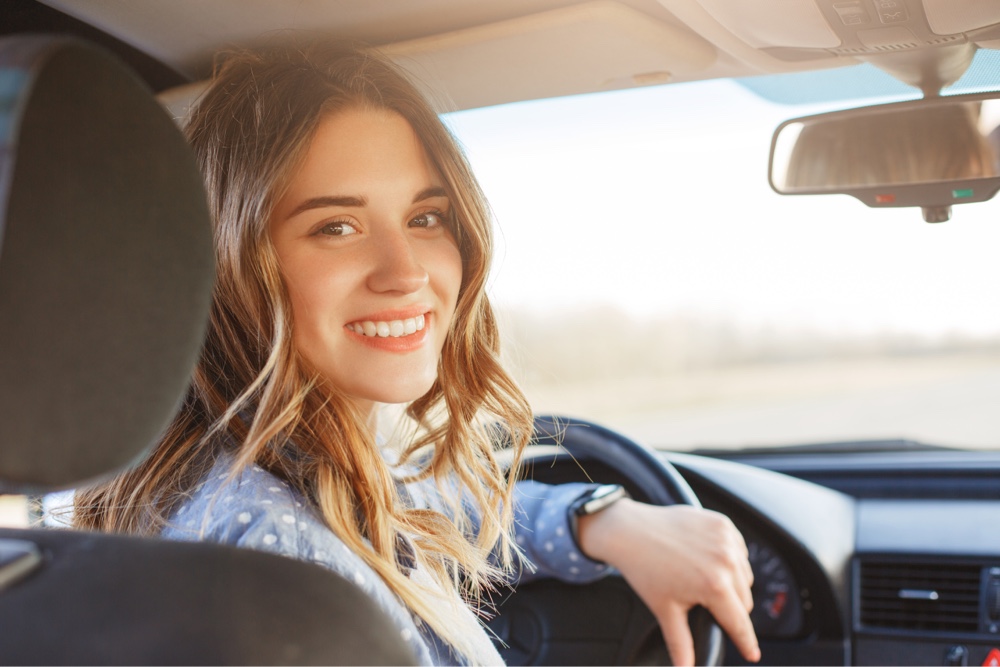 Woman behind the steering wheel