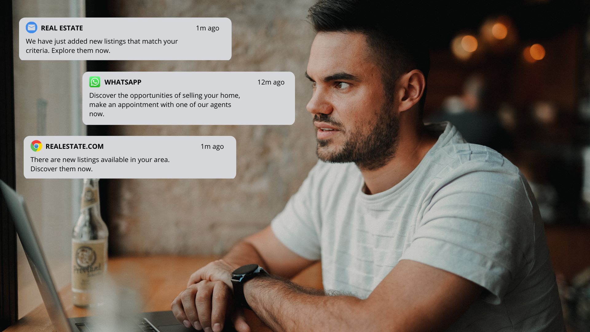  Man looking at his laptop with notifications