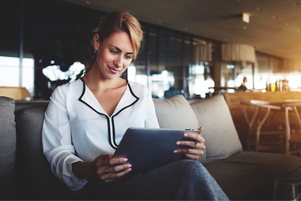 Woman looking at tablet