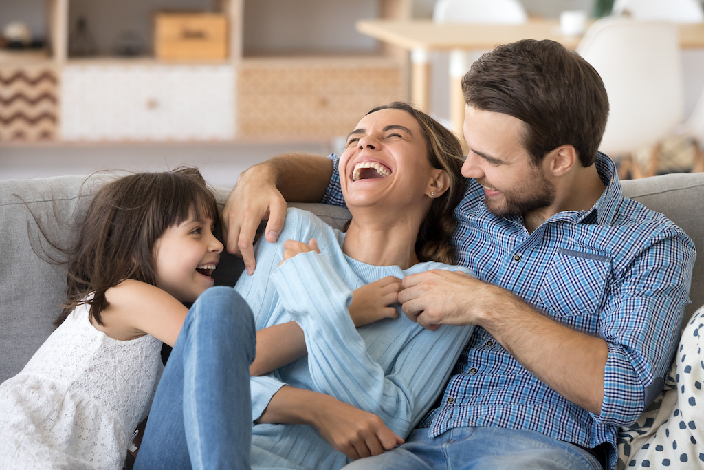 Happy family on the couch